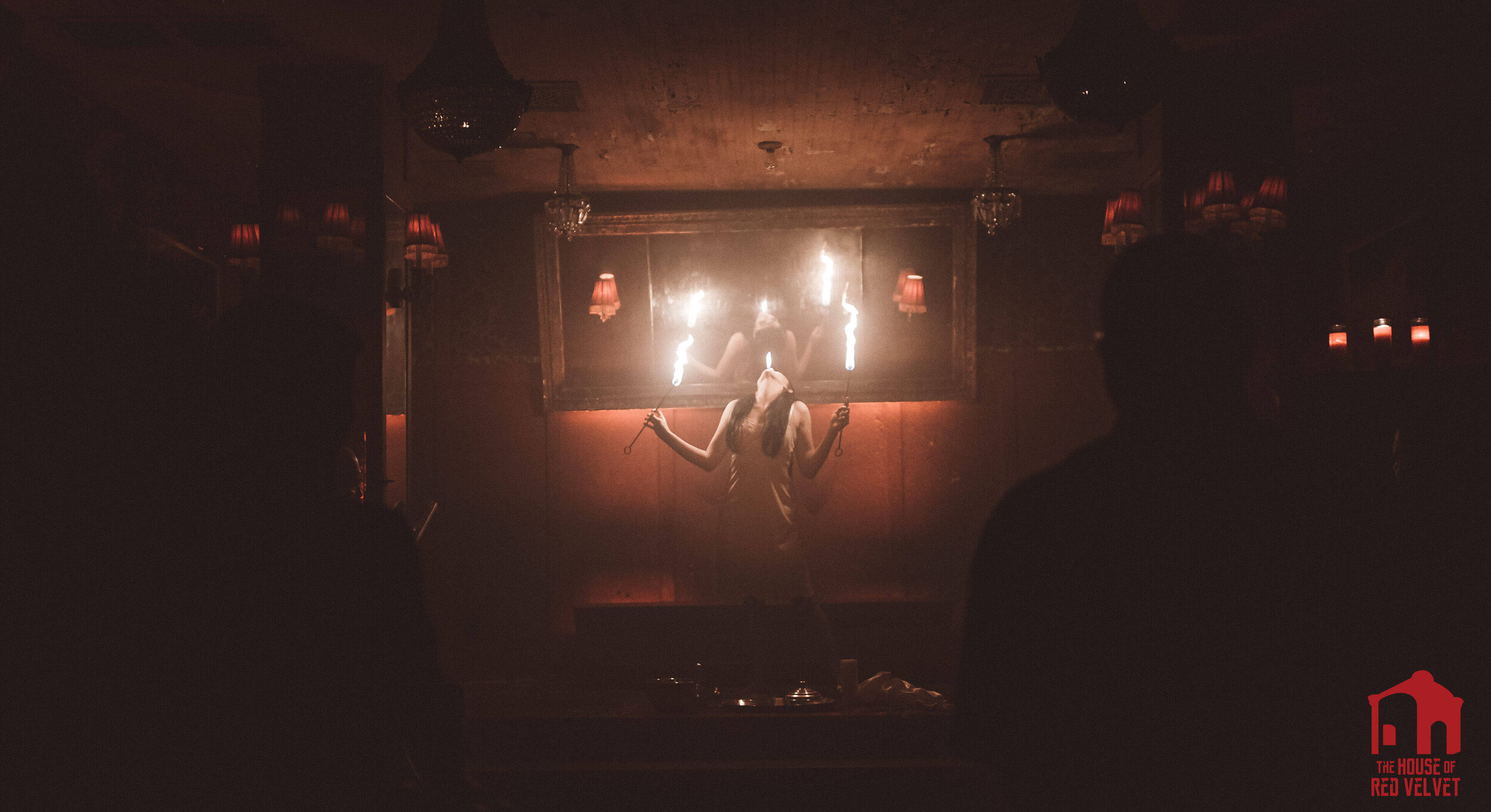 The House of Red Velvet. Avant Garde Brands. Fire Performer eating the flame.