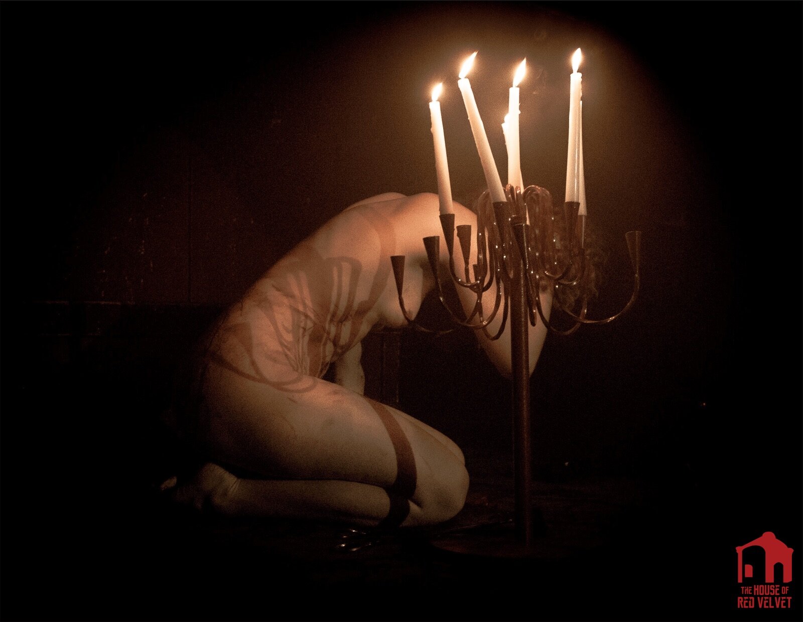 The House of Red Velvet. Surrealistic candle art.